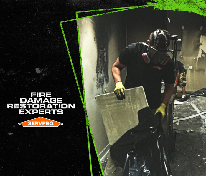Tech expert for fire cleanup from SERVPRO POSTER