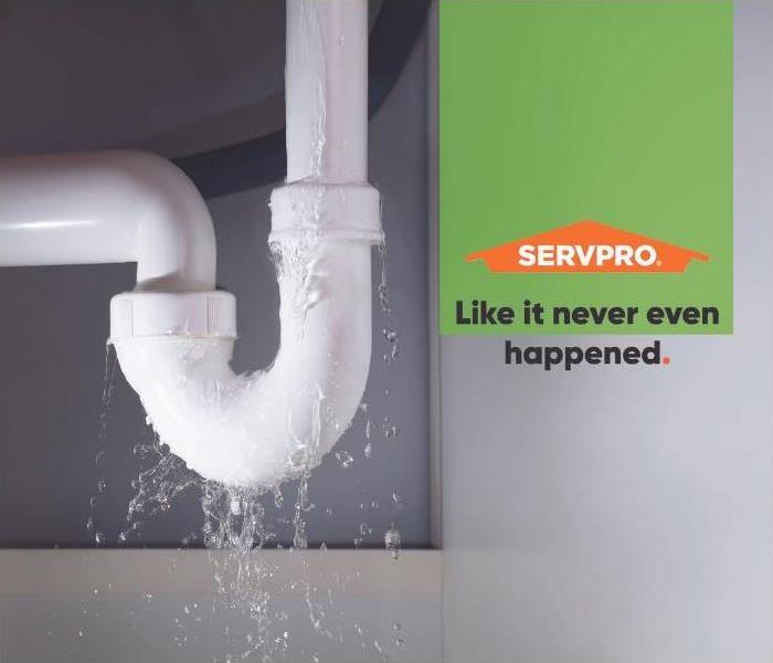 Pipe with water leaking with SERVPRO logo and text "Like it never even happened."