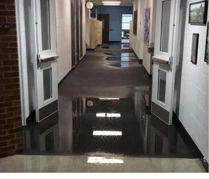 Hallway in business with flooded floor